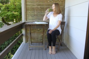 Donna Davidson drinking her daily Green Smoothie on the deck